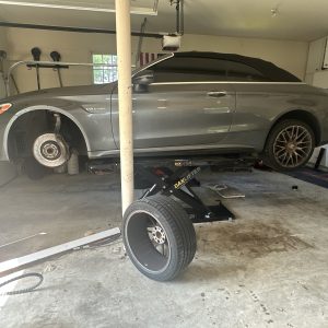 c63 on mid rise lift in TunedMercedes garage