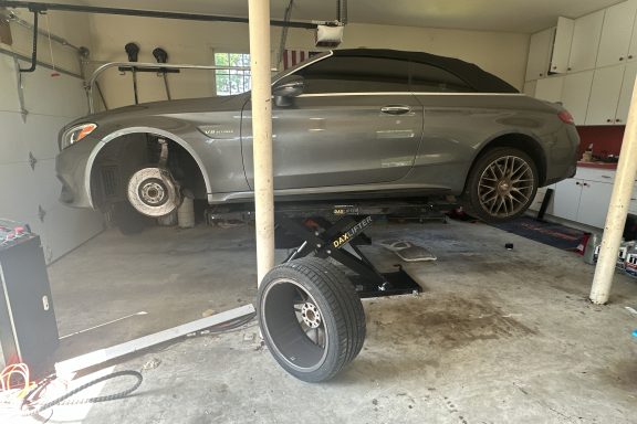 c63 on mid rise lift in TunedMercedes garage