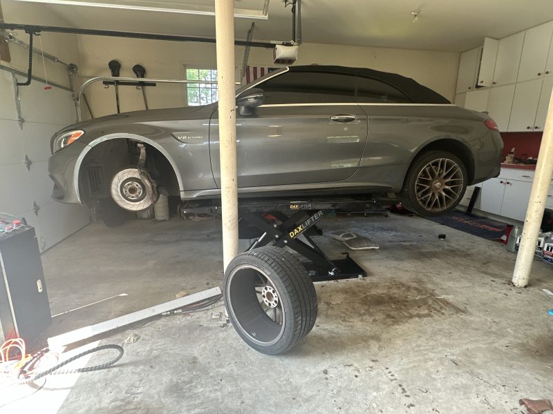 c63 on mid rise lift in TunedMercedes garage